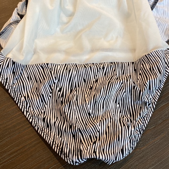 Kenneth Cole one piece swimsuit in size small. Skirt bottom. - Picture 8 of 8